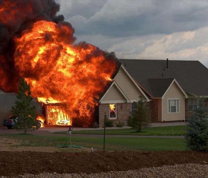 House fully engulfed in flames 